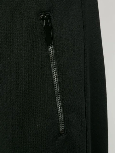 Shop Kru Belted Track Trousers In Black