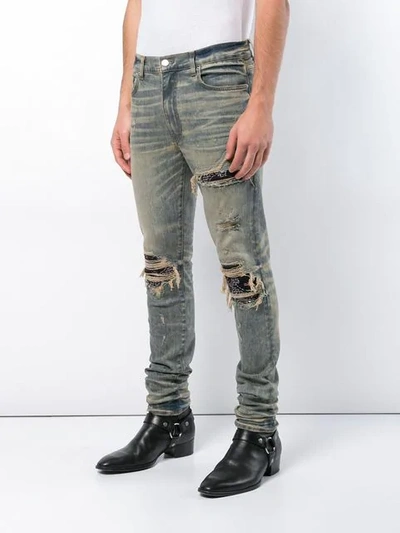 Shop Amiri Mx1 Ripped Bandana Jeans In Denim