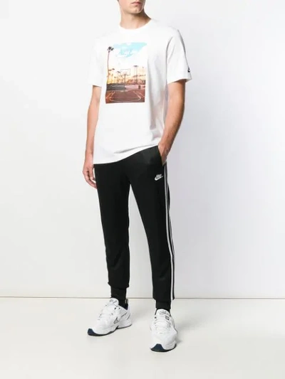 Shop Nike Photographic T In White