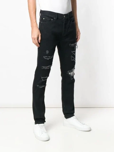 Shop Overcome Distressed Slim Jeans In Black