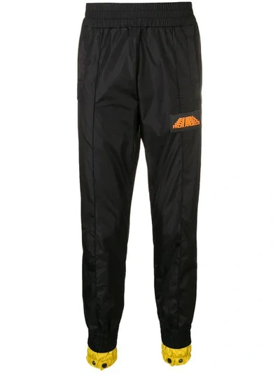 Shop Palm Angels Slim Fit Tapered Track Trousers In Black