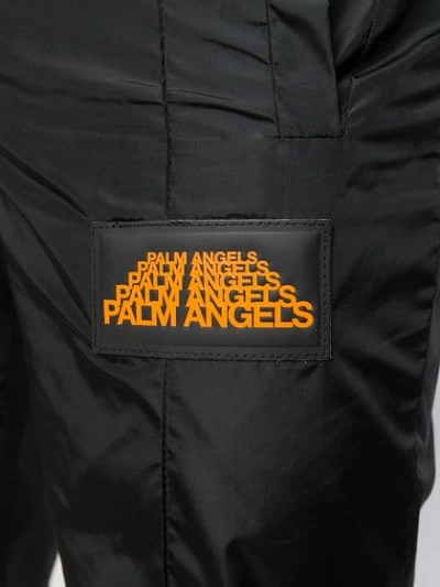 Shop Palm Angels Slim Fit Tapered Track Trousers In Black