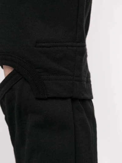 Shop Julius Cut-out Detail Track Pants In Black