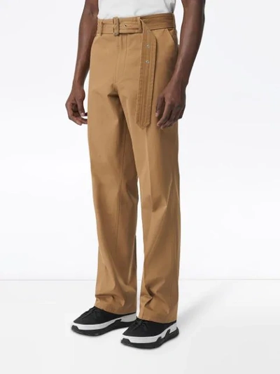 Shop Burberry D-ring Detail Belted Cotton Trousers In Neutrals