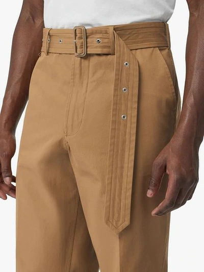 Shop Burberry D-ring Detail Belted Cotton Trousers In Neutrals