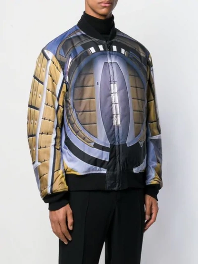 Shop Undercover Graphic Print Bomber Jacket In Black