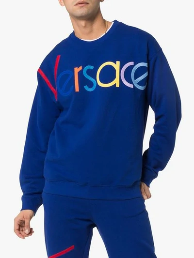 Shop Versace Blue Logo Embroidered Jumper