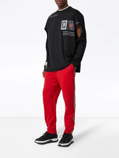 Shop Burberry Icon Stripe Detail Jersey Trackpants In Red