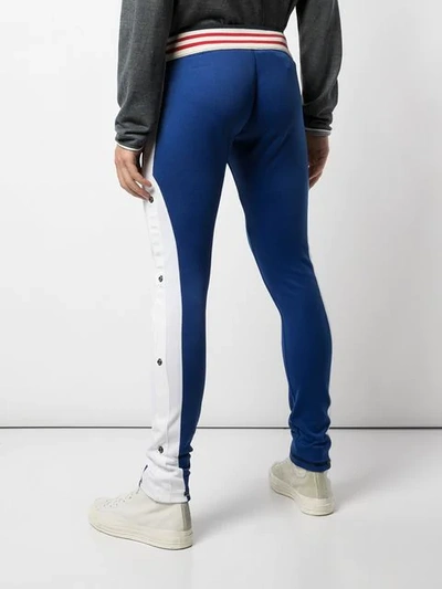 Shop Greg Lauren Colour Blocked Skinny Trousers In Blue
