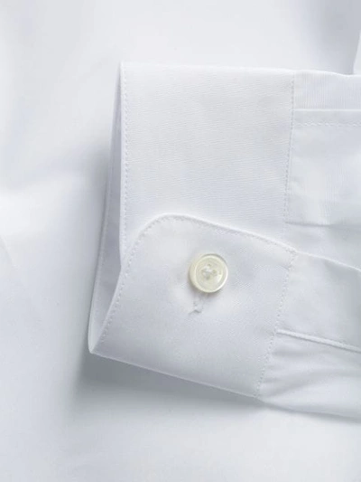 Shop Valentino Small Logo Print Curved Hem Shirt In White
