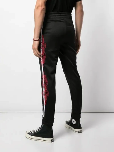 Shop Amiri Jersey Trackpants In Black