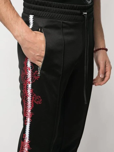 Shop Amiri Jersey Trackpants In Black