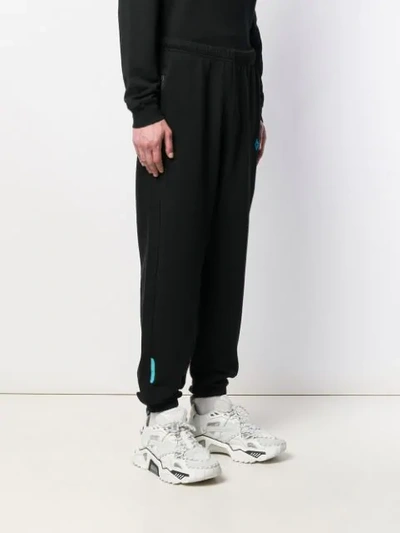 Shop Marcelo Burlon County Of Milan Embroidered Cross Track Pants In Black