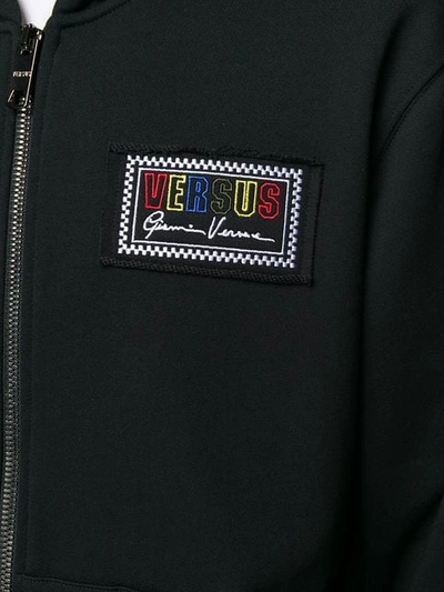Shop Versus Chest Logo Patch Zip Hoodie In Black