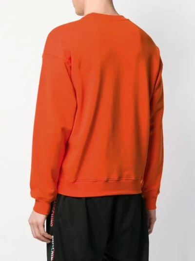 Shop Moschino Classic Logo Jersey Sweater In Orange