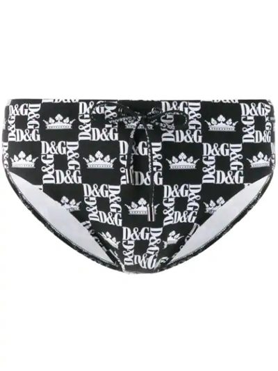 Shop Dolce & Gabbana Logo Grid Swim Shorts In Black