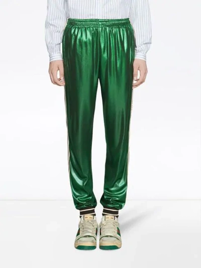 Shop Gucci Oversize Laminated Jersey Jogging Trousers - Green