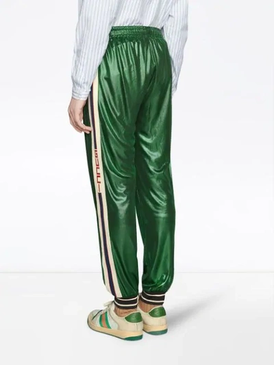 Shop Gucci Oversize Laminated Jersey Jogging Trousers - Green