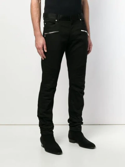 Shop Balmain Zip Embellished Jeans In Black