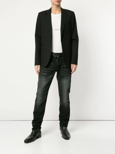 Shop Saint Laurent Low-waisted Jeans - Black