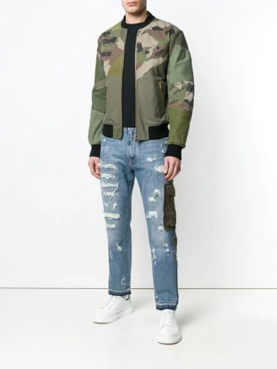 Shop Dolce & Gabbana Patched Camouflage Bomber Jacket - Green