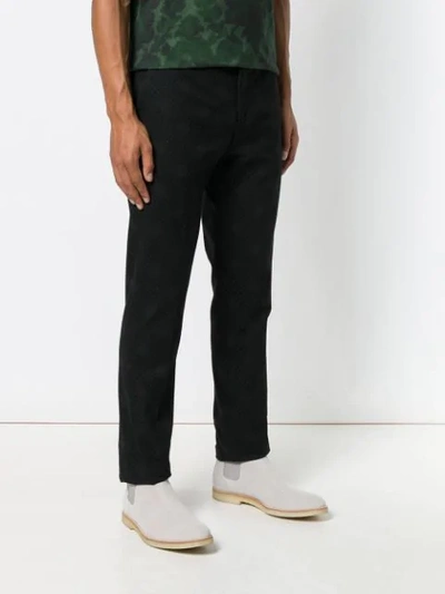 Shop Etro Printed Slim Fit Trousers In Black