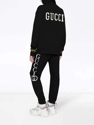 Shop Gucci Jogging Pants With  Print In Black