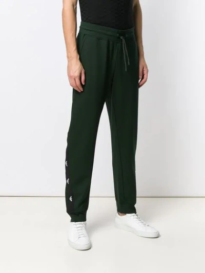 Shop Emporio Armani Logo Track Pants In Green