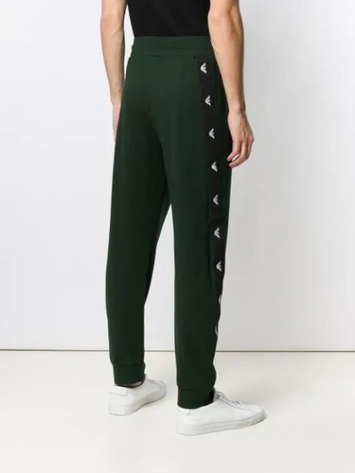 Shop Emporio Armani Logo Track Pants In Green