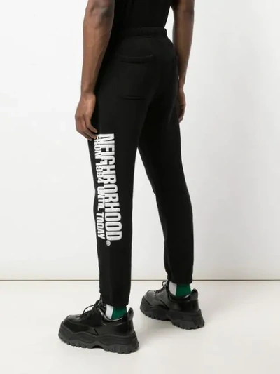 Shop Neighborhood Side Logo Print Track Pants In Black