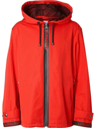 Shop Burberry Logo Detail Nylon Cotton Twill Hooded Jacket In Red