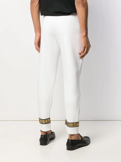 Shop Versace Collection Slim Fit Trousers - Weiss In White