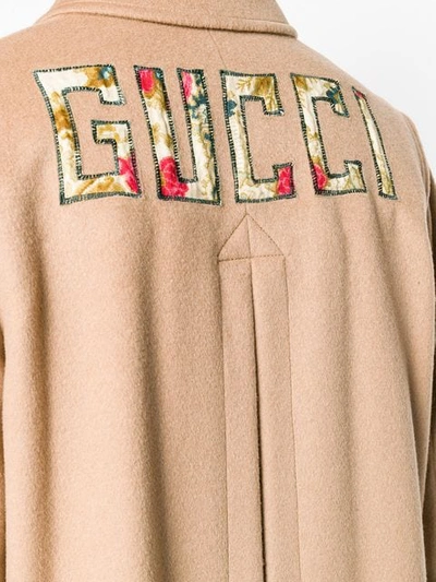 Shop Gucci Logo Embroidered Coat In Brown