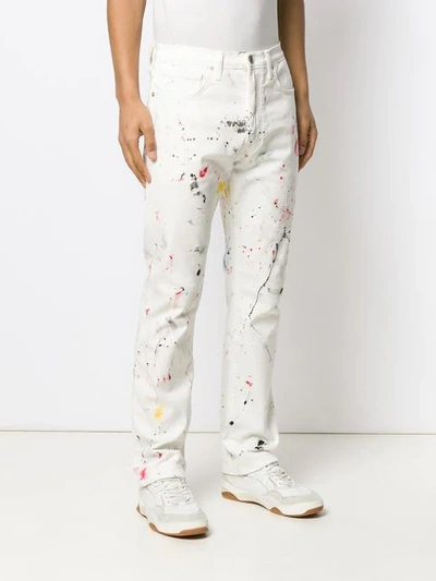 Shop Lost Daze Paint Splatter Straight Leg Jeans - White