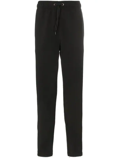 Shop Burberry Icon Stripe Jersey Trackpants In Black