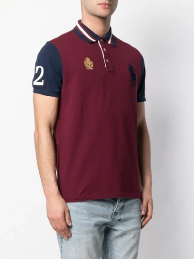 Shop Polo Ralph Lauren Embroidered Crest Logo Polo Shirt In Red