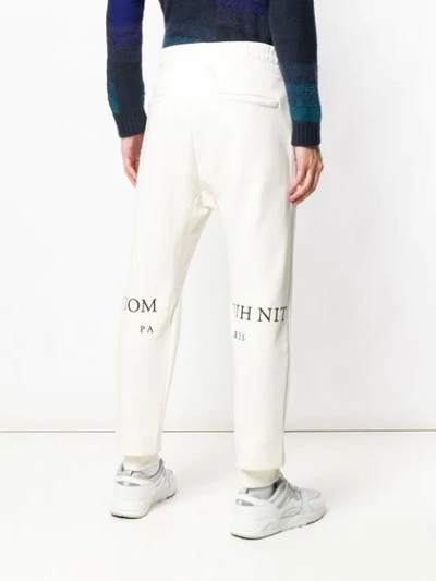 Shop Ih Nom Uh Nit Loose Fitted Trousers In White