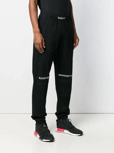 Shop Ih Nom Uh Nit Logo Track Pants In Black