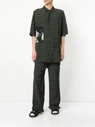 Shop Ex Infinitas Off The Grid Checked Drawstring Trousers In Black