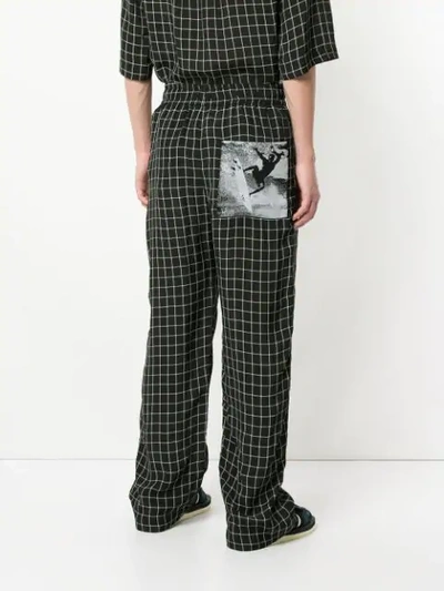 Shop Ex Infinitas Off The Grid Checked Drawstring Trousers In Black