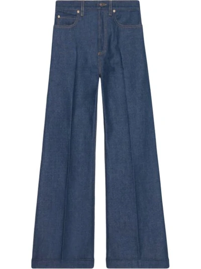 Shop Gucci Washed Denim Flare Pants - Blue