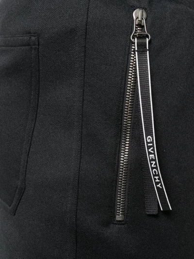 Shop Givenchy Zipped Pocket Track Pants In Black