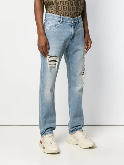 Shop Fendi Distressed Jeans In Blue