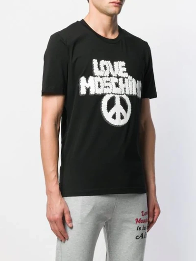 Shop Love Moschino Graphic T-shirt In Black