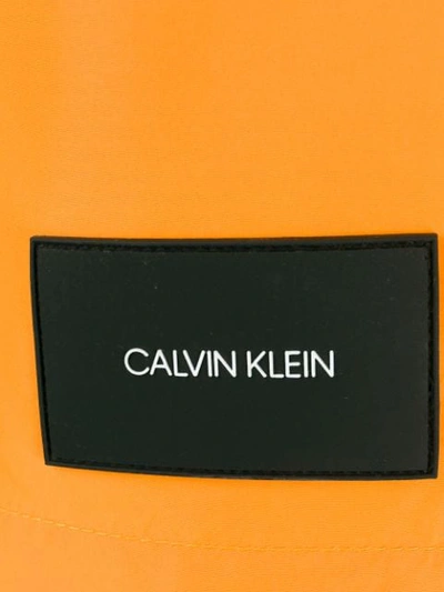 Shop Calvin Klein Underwear Logo Patch Swimming Shorts In Orange