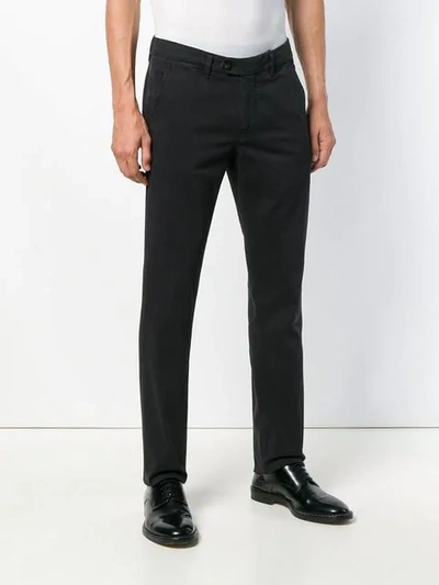 Shop Corneliani Tailored Fitted Trousers In Black