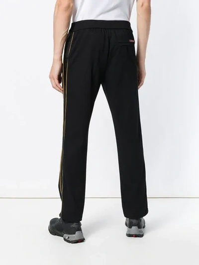 Shop Prada Side Stripe Track Pants In Black