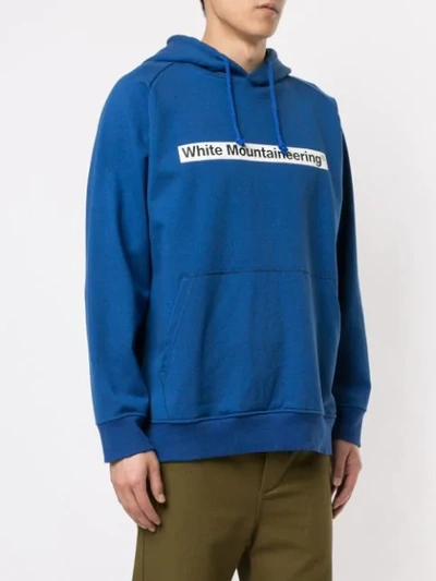 Shop White Mountaineering Logo Patch Drawstring Hoodie In Blue