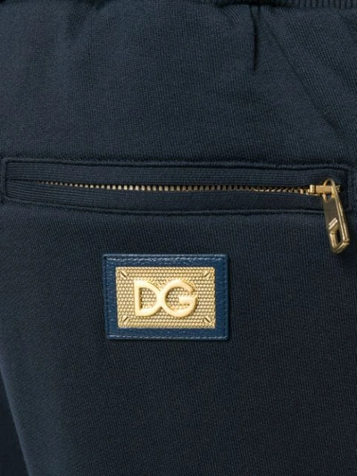 Shop Dolce & Gabbana Tapered Track Pants In Blue