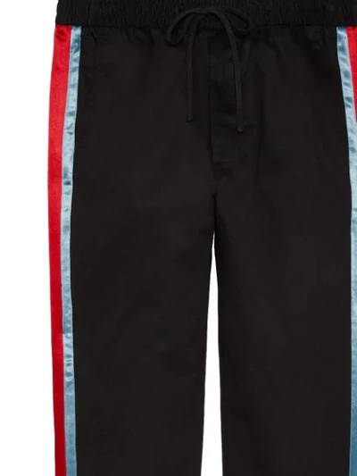 Shop Gucci Drawstring Web Stripe Trousers In Black